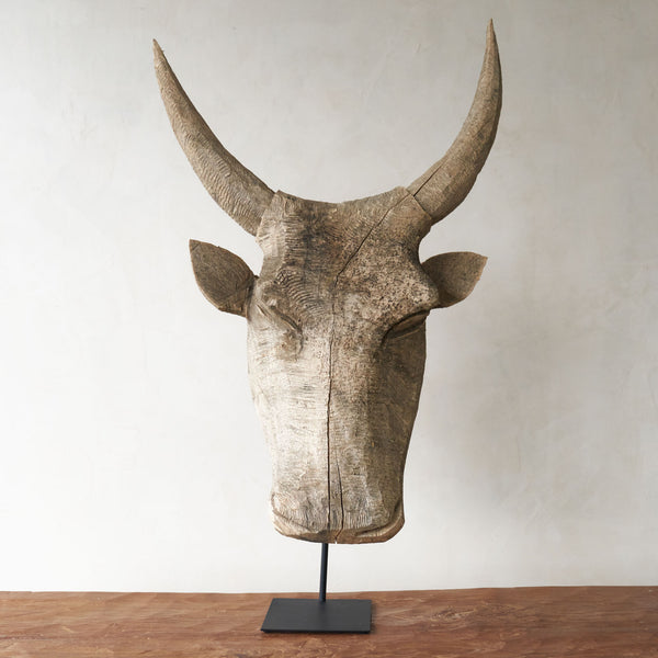 Carved Headdress, Unique wooden bull head home accessory from Africa. Solid Dogwood, local African hardwood. Handcarved, one-of-a-kind touch for any home. From $580