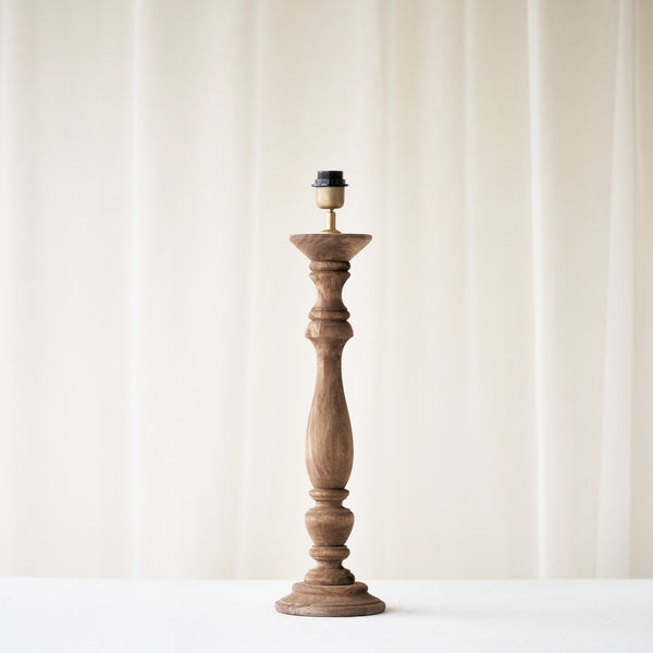 Bellini Table Lamp, wooden and delicately shaped. Sophisticated and stylish piece. It is a versatile piece that provides a rustic touch in any home. Available at $220.