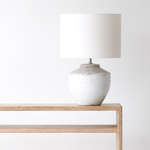 Toba Table Lamp, textured finish. Unique and versatile piece that provides a touch of drama in any home. Available at $360.