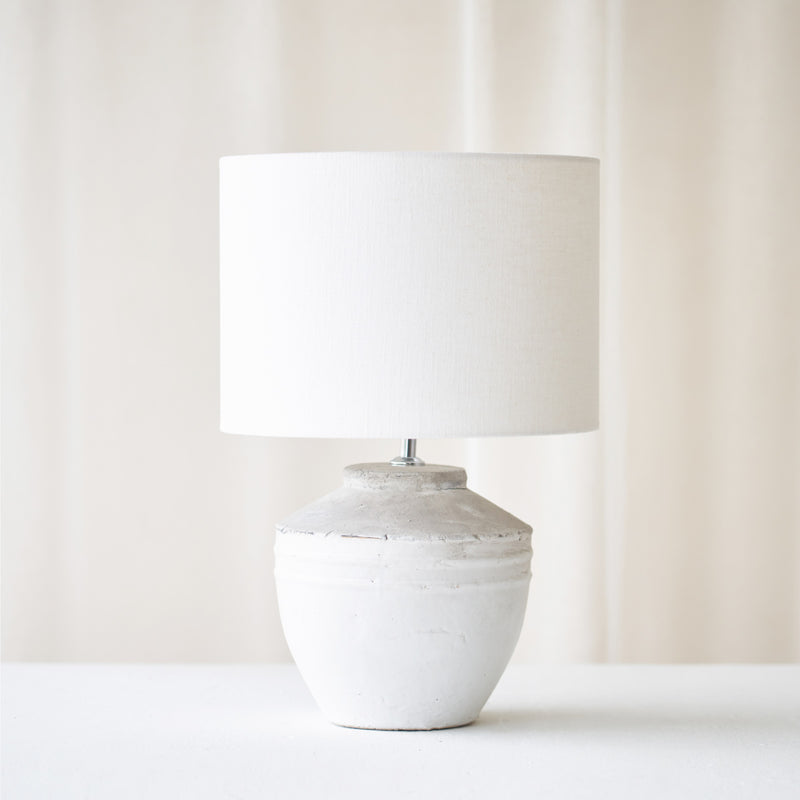 Toba Table Lamp, textured finish. Unique and versatile piece that provides a touch of drama in any home. Available at $360.